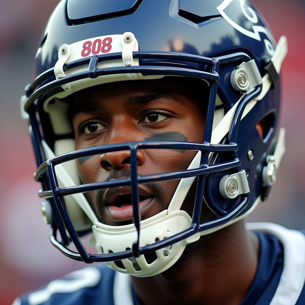 808 football facemask close up on a player during a game