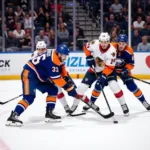 Players aggressively pressuring the puck carrier in the offensive zone