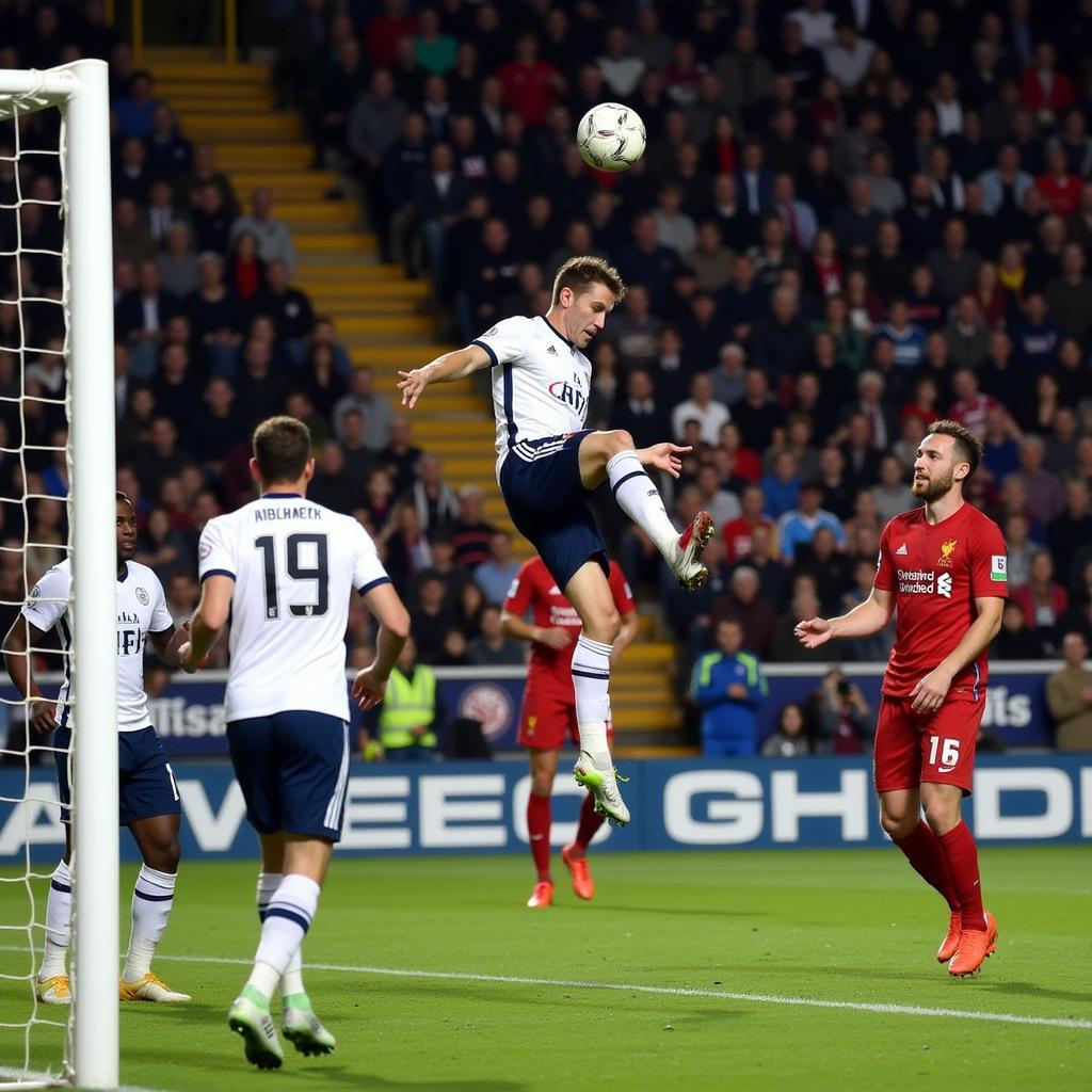 Andrews scores a powerful header