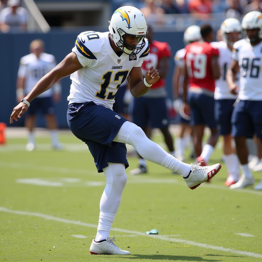 Brandon Aubrey kicking a field goal