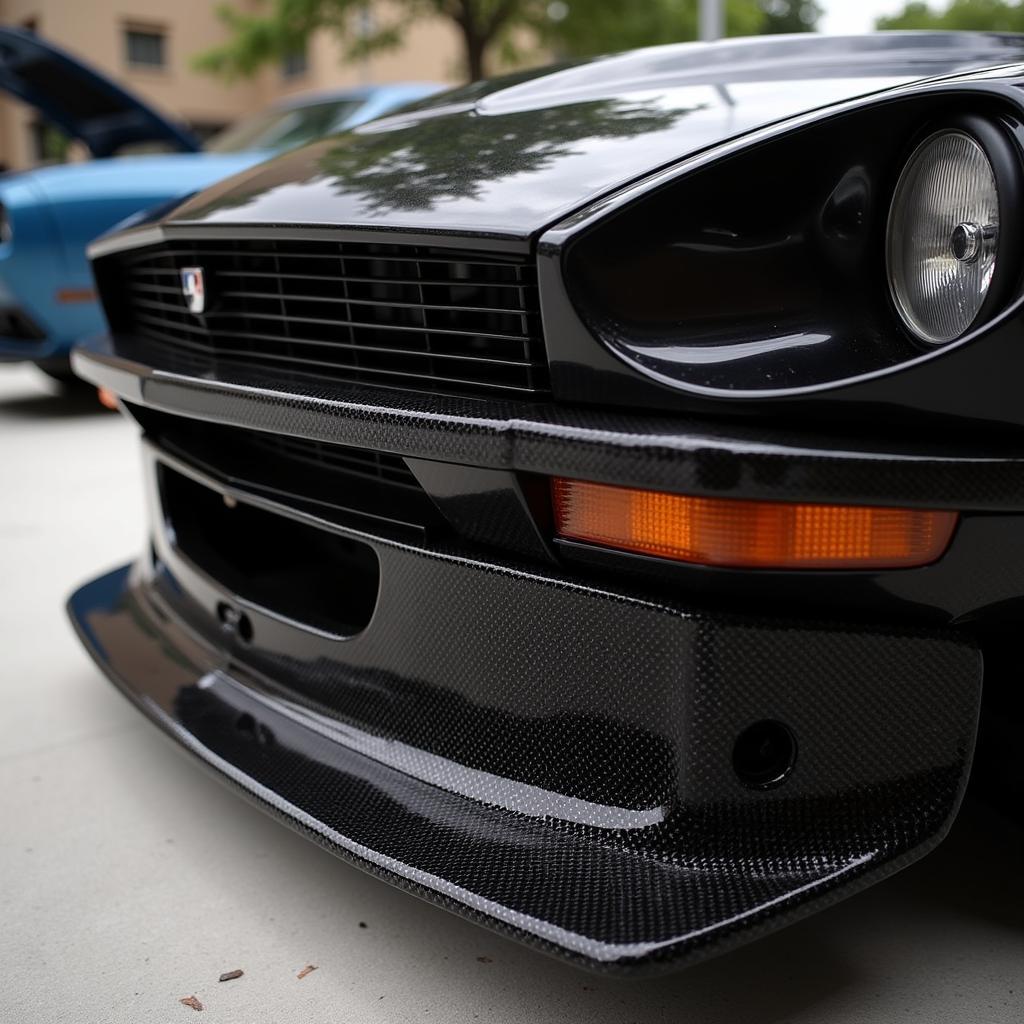 Close-up of carbon fiber weave on a Datsun 240z body kit component