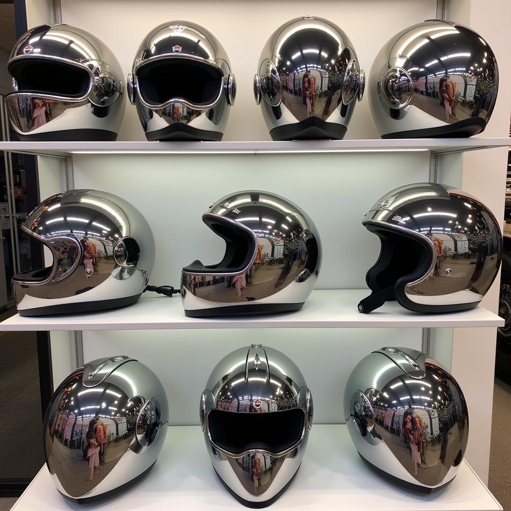 Various chrome helmets on display