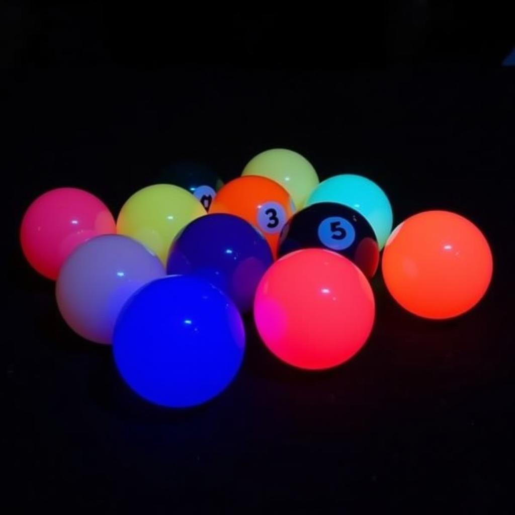 Glow pool balls set under blacklight.