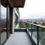 Modern Balcony with Half Wall and Railing