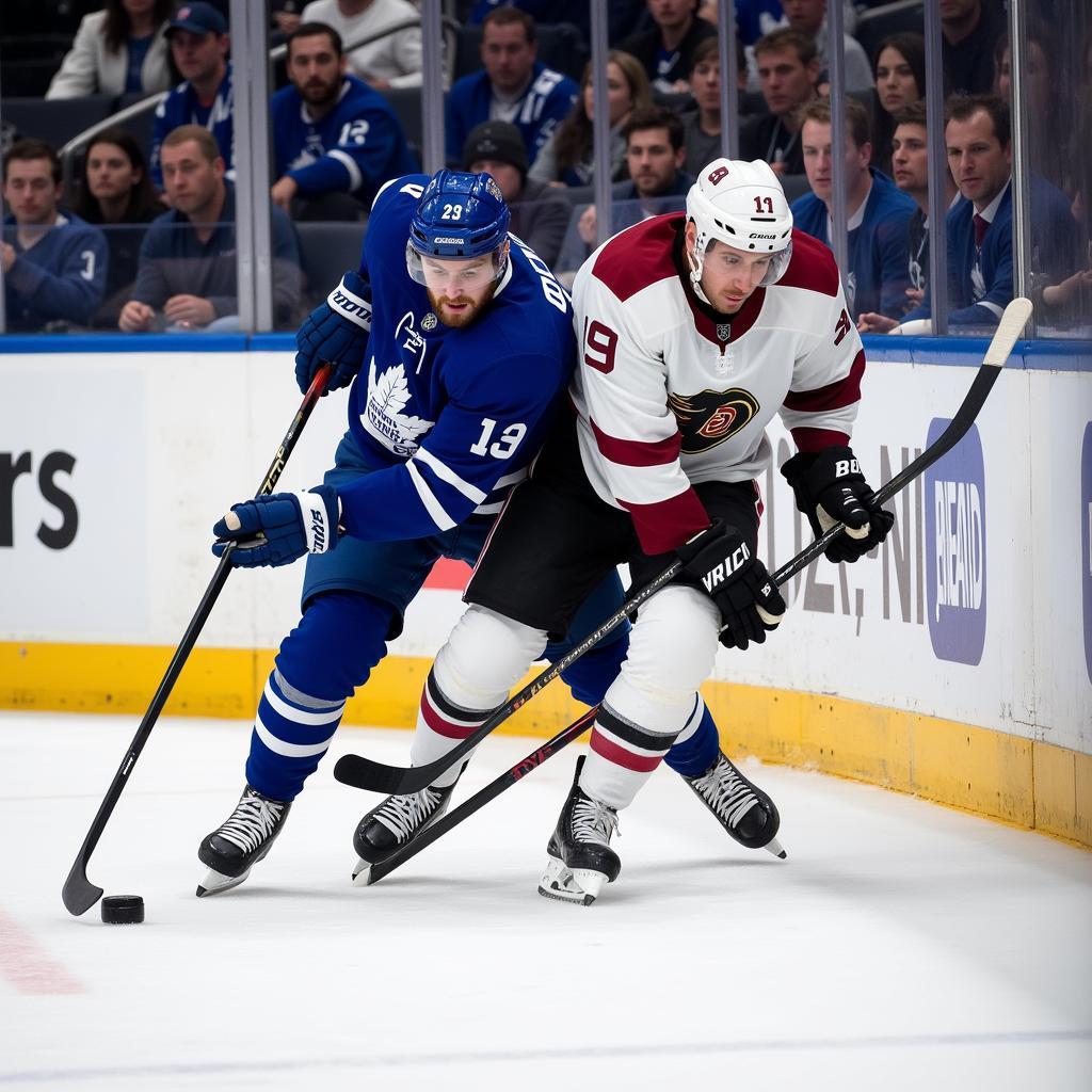 Hockey players battling for possession of the puck during a trap play