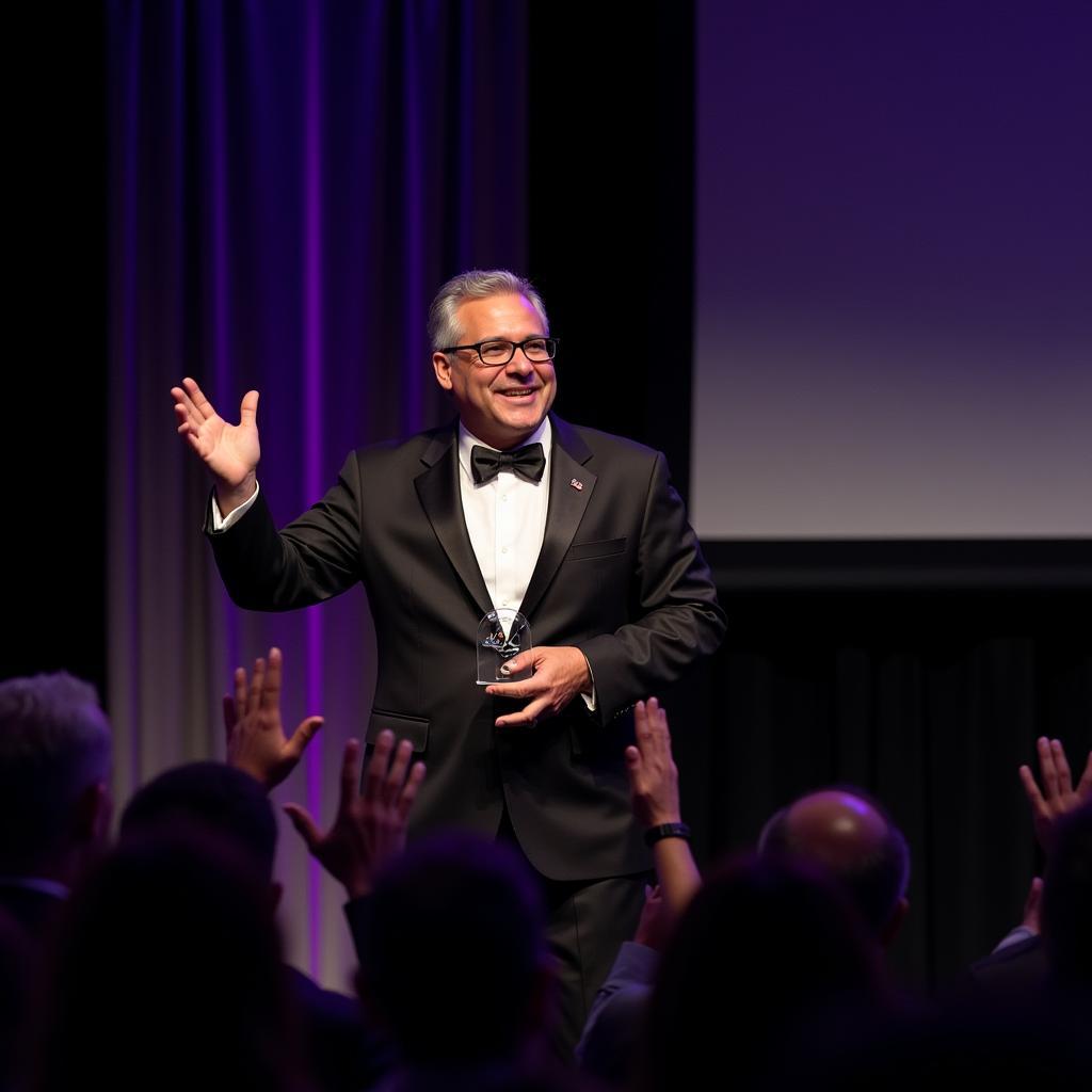 Ignacio Gonzalez-Lang accepting an award for his contributions to the gaming industry