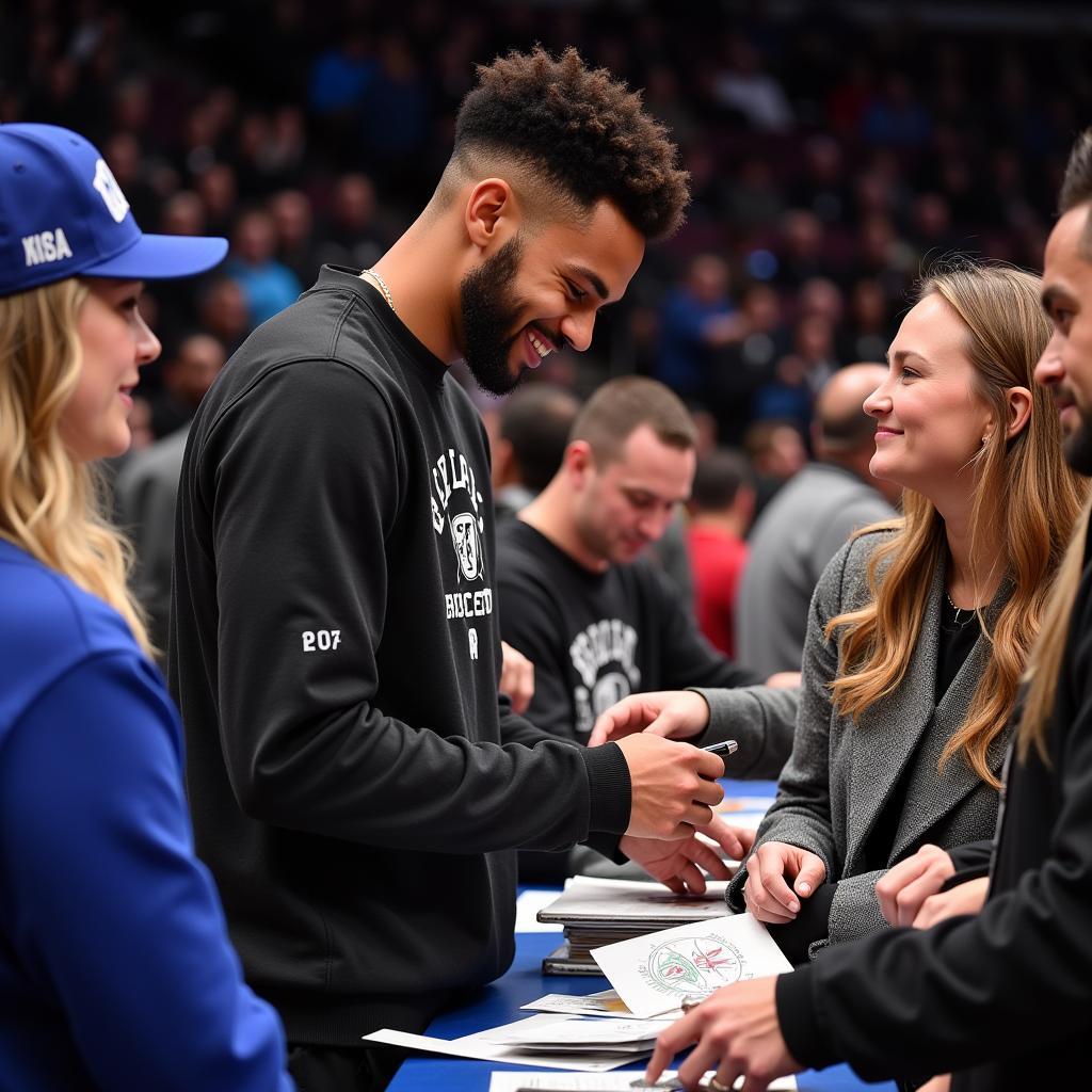 Jamal Murray signing autographs for fans