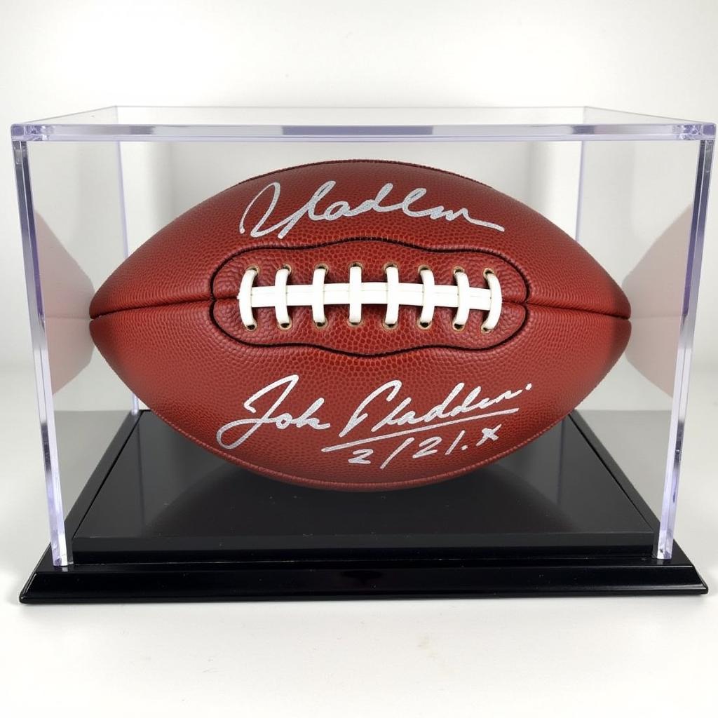 John Madden Autographed Football in Display Case