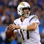 Justin Herbert throws a pass during a game