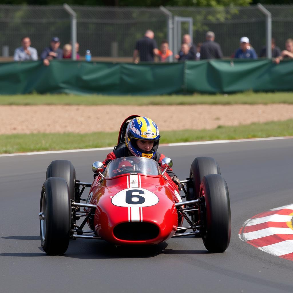 A close-up image of a Lewis Hamilton Formula 1 driver card, featuring a dynamic photo of him racing