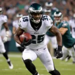 Miles Sanders rushing for the Eagles