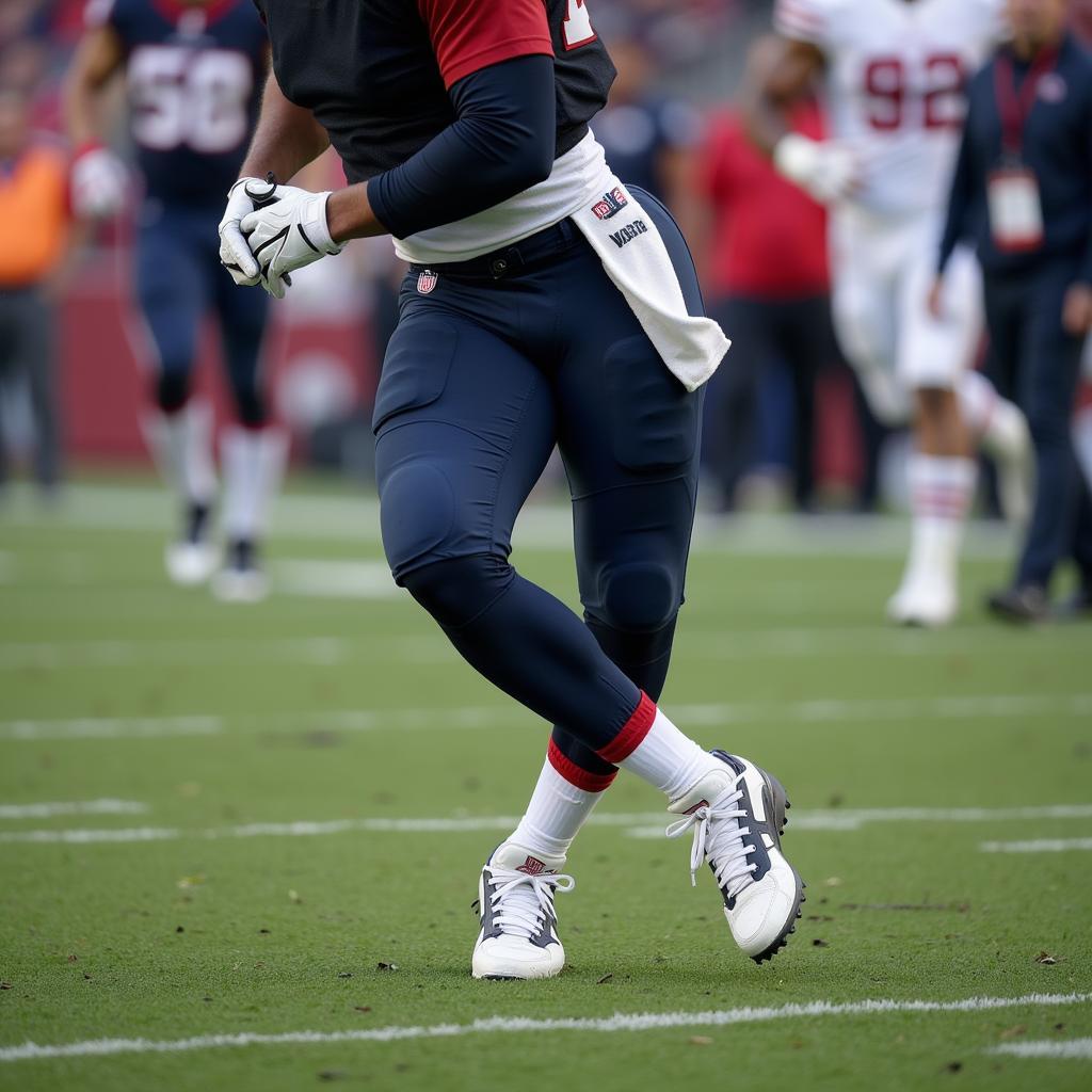 NFL Player in Action Wearing Game Pants