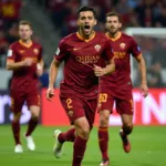 AS Roma players celebrating a goal against Udinese