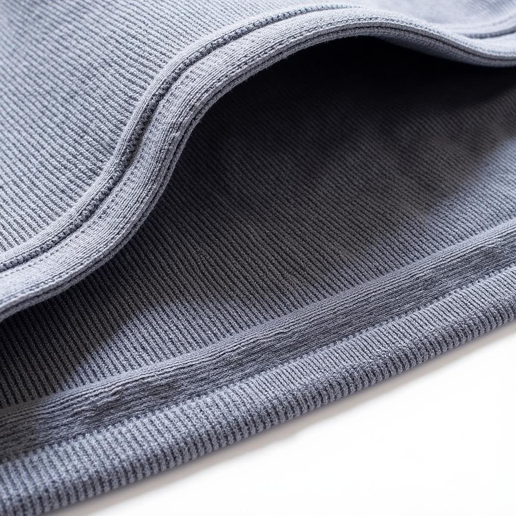 Close-up of the breathable fabric of a football turtleneck undershirt