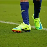 Jadon Sancho wearing Nike Mercurial Vapor cleats during a match