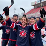 Hockey Players Celebrating a Victory at a Mass Hockey Festival