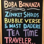 Examples of catchy boba shop names written on a chalkboard.