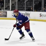 Charlie Coyle demonstrating his stick flex during a practice session
