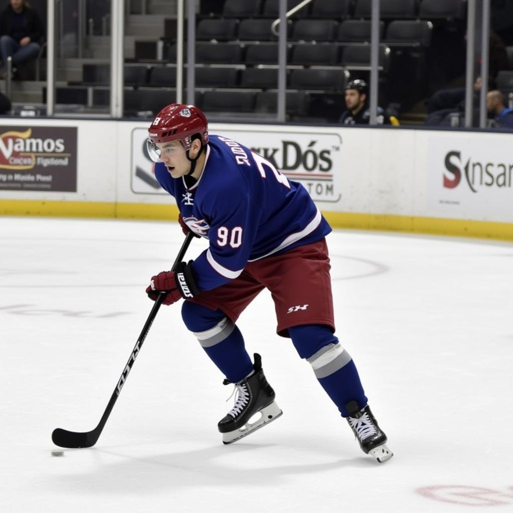 Charlie Coyle demonstrating his stick flex during a practice session