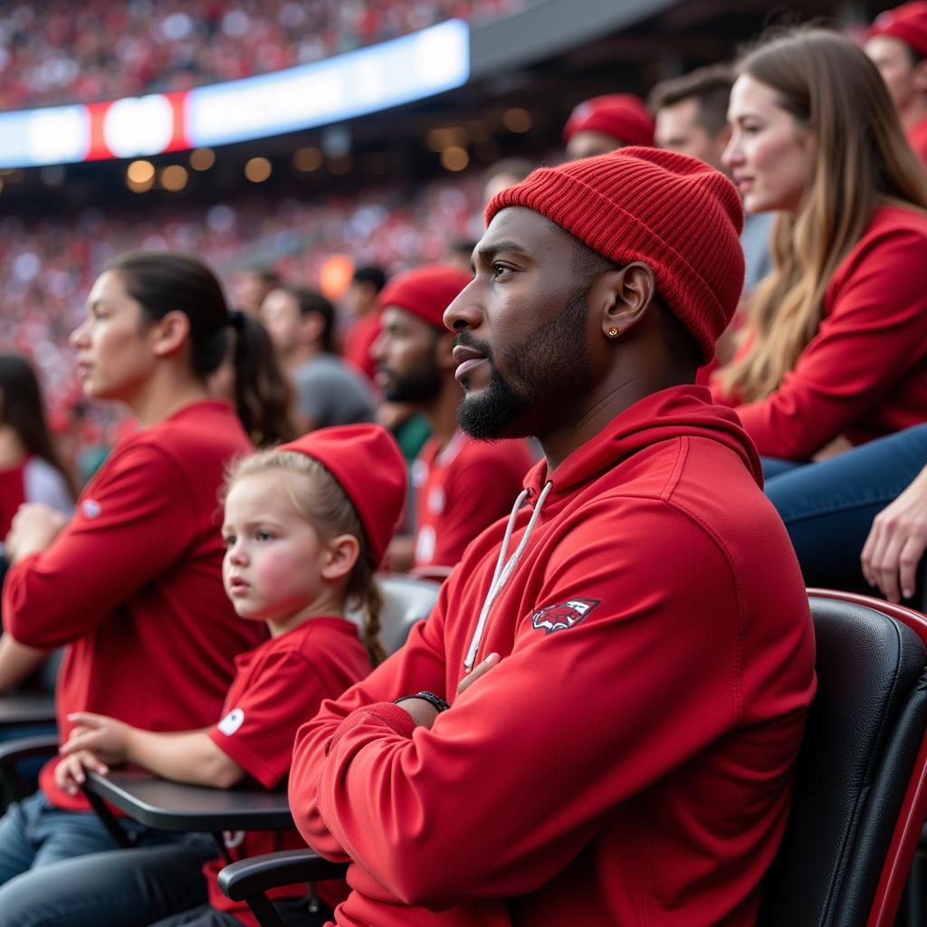 Fans wearing Derrick Henry red sleeve replicas